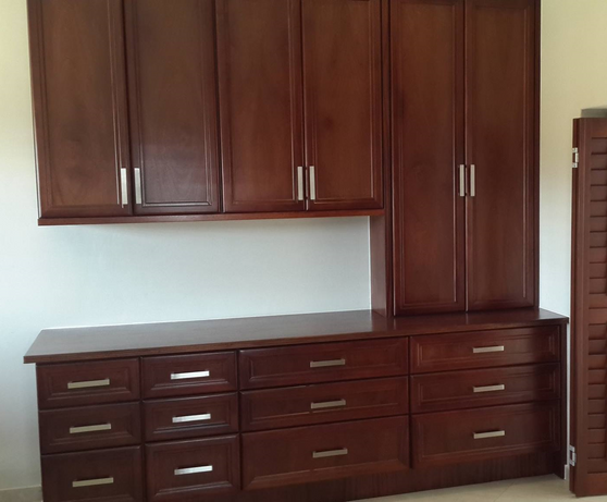 wooden cabinets and drawers in a room